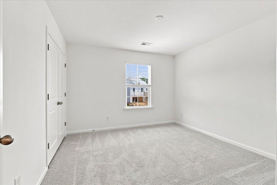 Spacious, unfurnished interior of a new home in Creekside at Andrews, Summerville (Image 15).