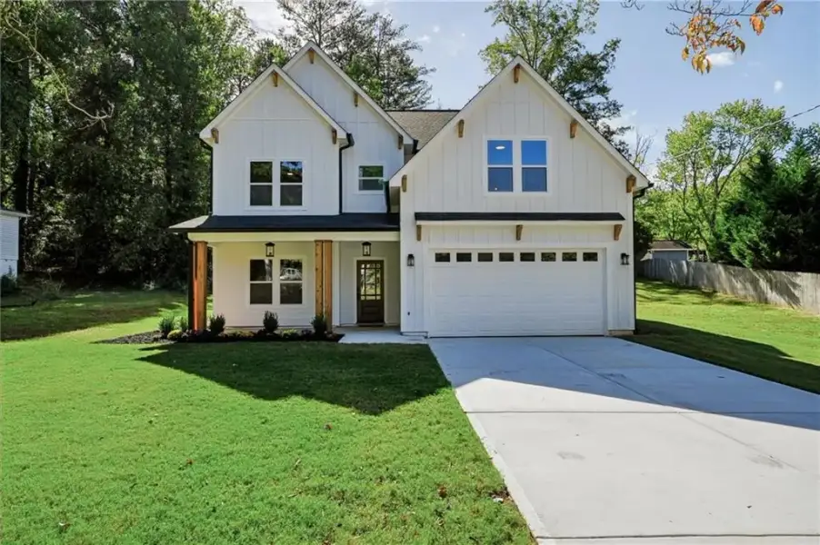 Front exterior of a new home in , Austell, GA, highlighting curb appeal (Image 2). Front exterior of a new home in , Austell, GA, highlighting curb appeal (Image 2).