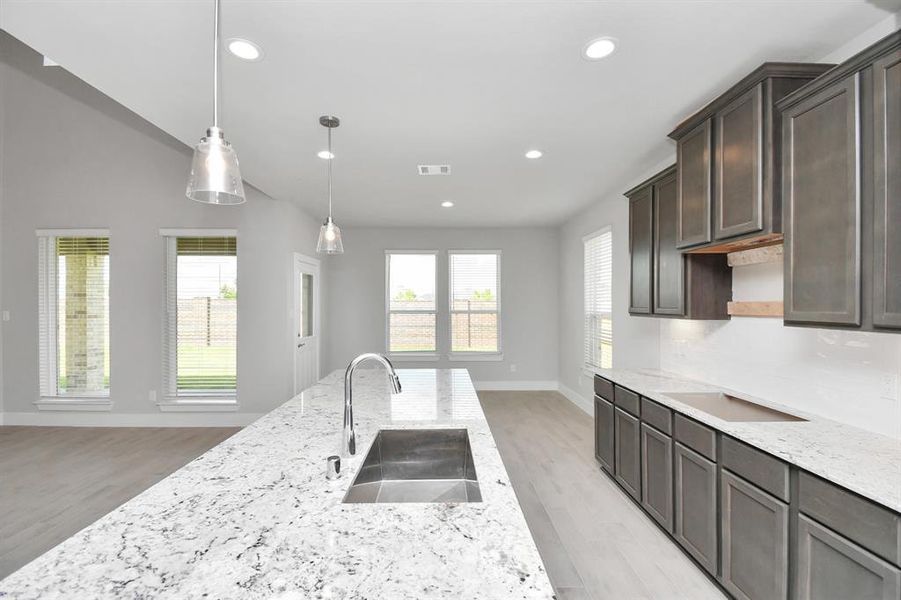 This generously spacious kitchen is a dream realized!