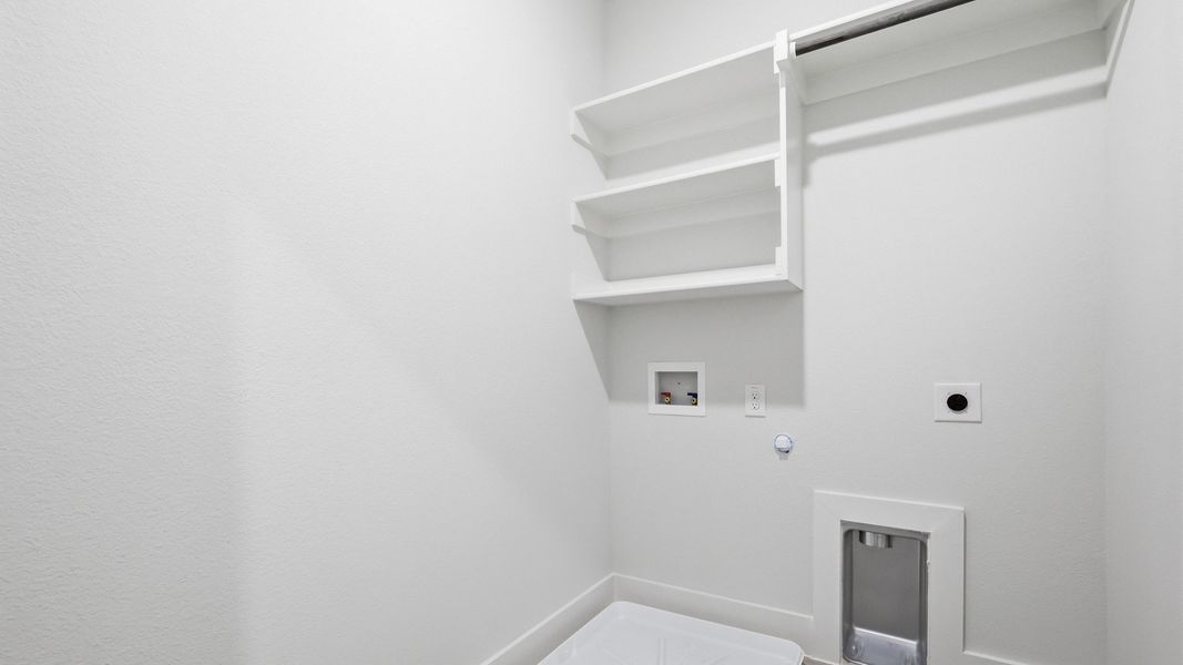 Furnished interior view inside a new home in Collin Creek, Plano (Image 33).