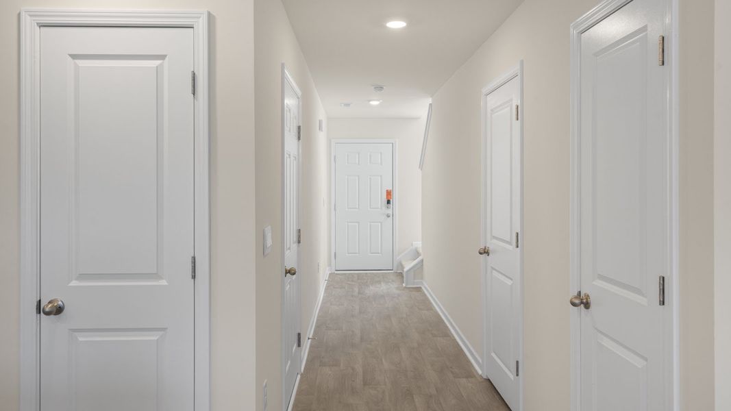 Representative unfurnished interior of a home built from the Pearson by D.R. Horton in The Townes at Ridgewood Farms, Winterville (Image 13).