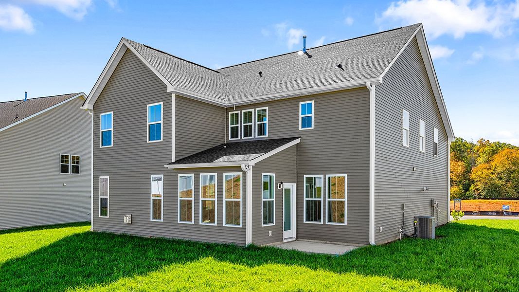 Exterior details and patio area of a home in Hanes Lake, Winston-Salem (Image 3).