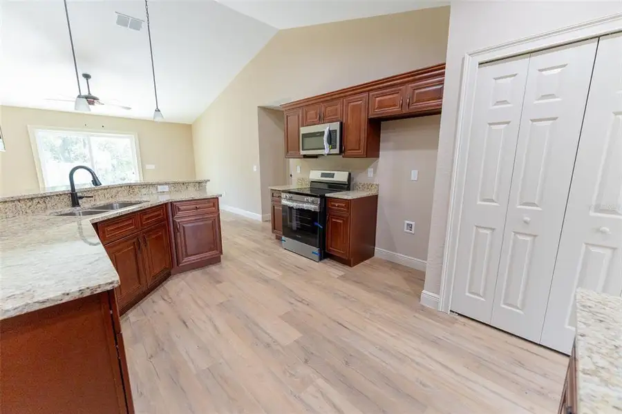 Furnished interior view inside a new home in , Ocala (Image 7).