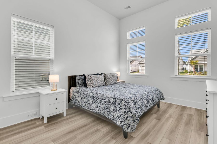 Furnished interior view inside a new home in Summerwind Crossing at Lakes of Cane Bay, Summerville (Image 13).