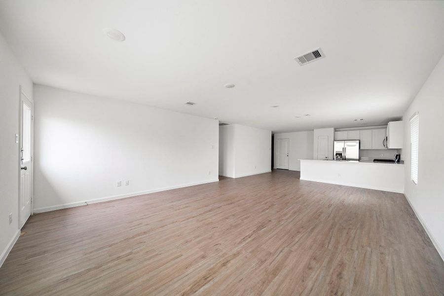 Another view of the living area with access to the backyard.