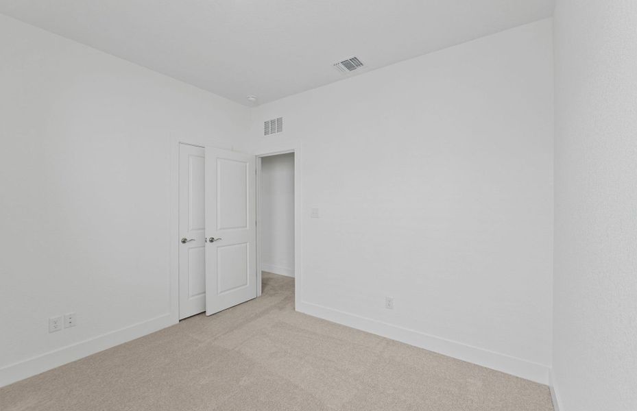 Spacious, unfurnished interior of a new home in Saddleback at Santa Rita Ranch, Liberty Hill (Image 38).