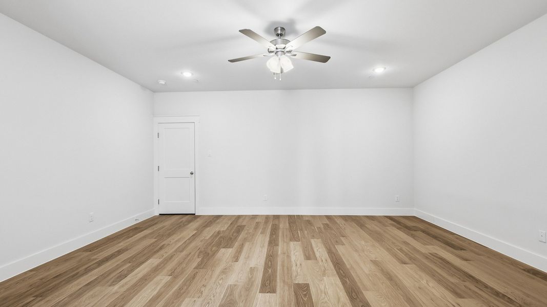 Furnished interior view inside a new home in Collin Creek, Plano (Image 14).