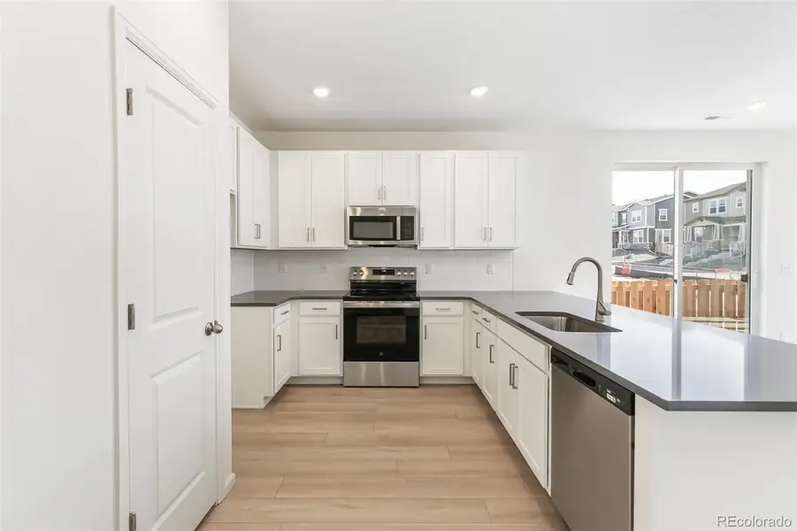 Furnished interior view inside a new home in Turnberry, Commerce City (Image 10).
