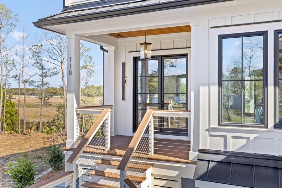 Exterior details and patio area of a home in , Charleston (Image 51).