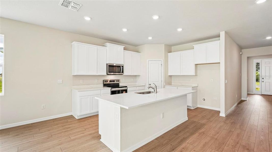 Furnished interior view inside a new home in Bella Lago, Parrish (Image 5).
