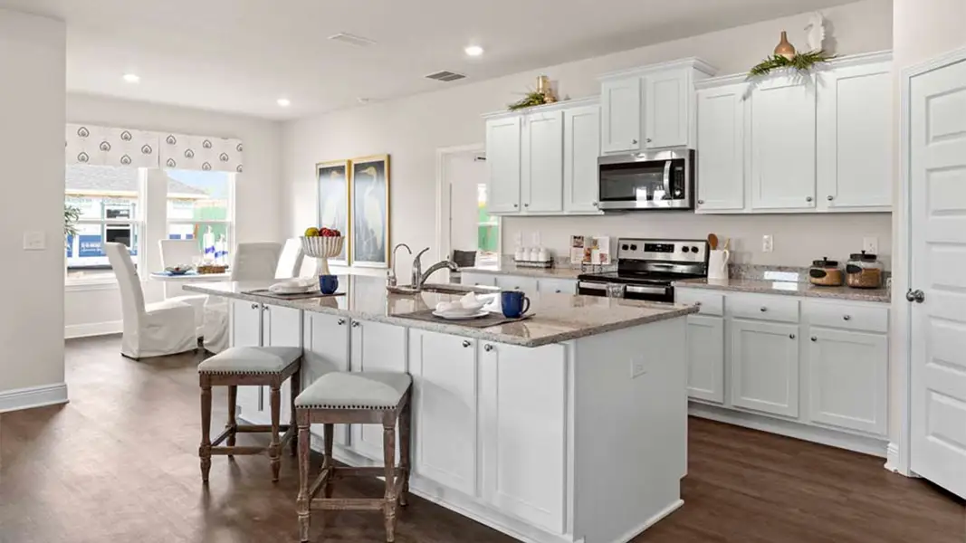 Representative furnished interior of a home built from the The Camden by D.R. Horton in Liberty, Panama City (Image 14).