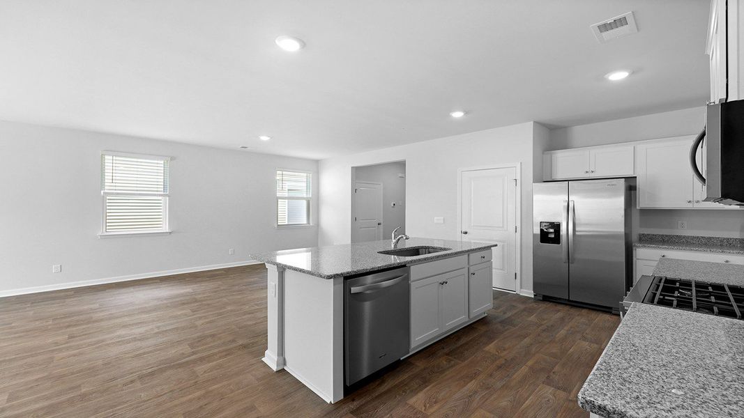 Furnished interior view inside a new home in Pine Hills at Cane Bay, Summerville (Image 6). Furnished interior view inside a new home in Pine Hills at Cane Bay, Summerville (Image 6).