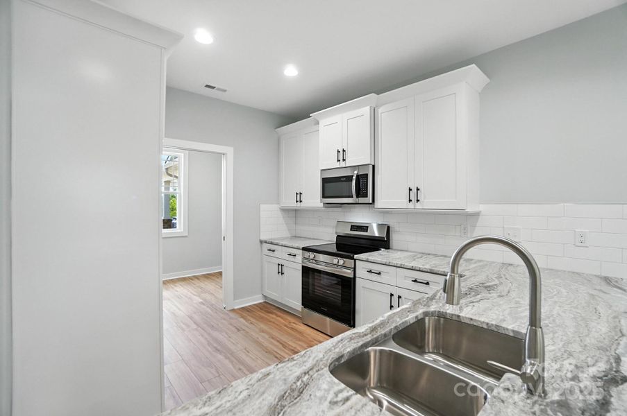 Furnished interior view inside a new home in , Hickory (Image 7).