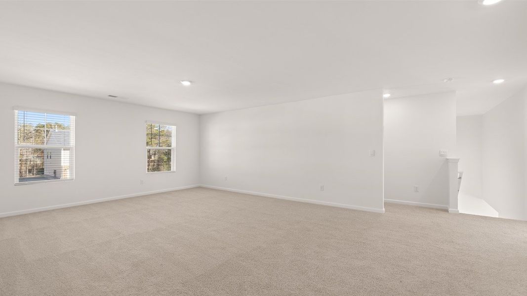 Representative unfurnished interior of a home built from the Mansfield by D.R. Horton in Brooks Station, Dacula (Image 26).