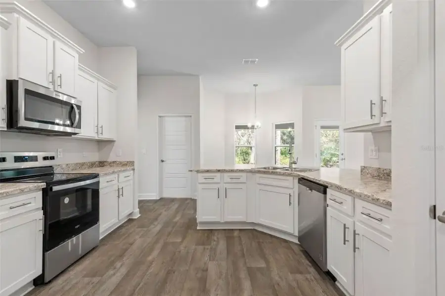 Representative furnished interior of a home built from the 2265 by Adams Homes in Flagler Estates, Hastings (Image 7).