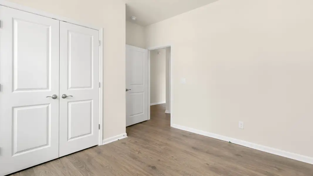Spacious, unfurnished interior of a new home in The Villas at Galvins Ridge, Sanford (Image 24).