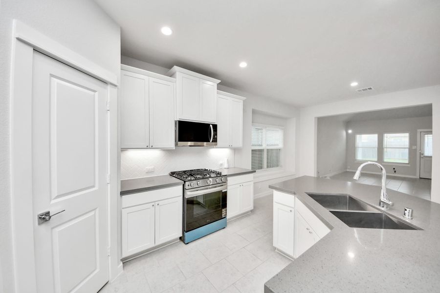 Furnished interior view inside a new home in Willow Trace, Spring (Image 22).