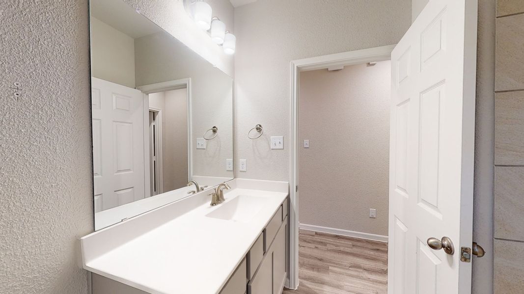 Representative furnished interior of a home built from the Floor Plan 2175 by Colina Homes in Grand Magnolia, Magnolia (Image 9).