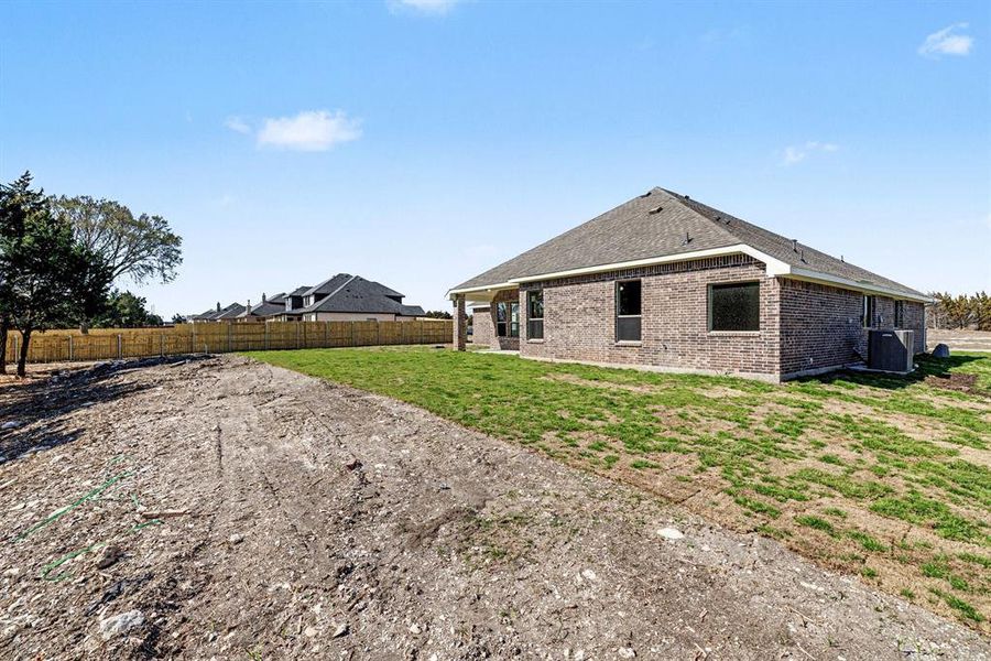 Exterior details and patio area of a home in Sagebrush Addition, Midlothian (Image 4).