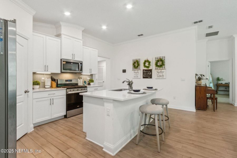 Furnished interior view inside a new home in Dorado at Entrada, St. Augustine (Image 32).