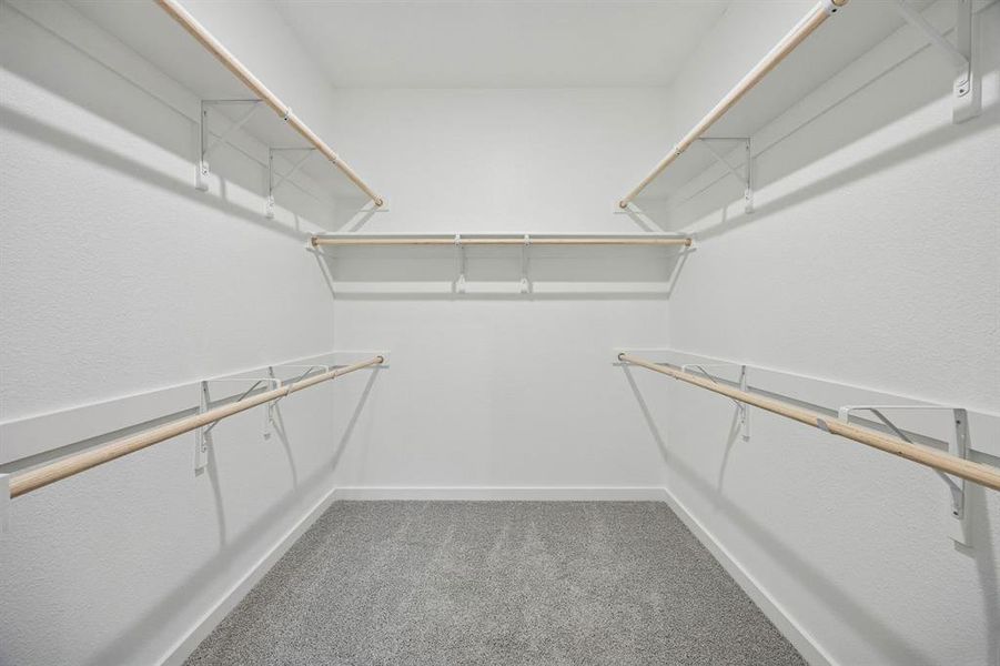 Primary Closet in the Masters home plan by Trophy Signature Homes – REPRESENTATIVE PHOTO