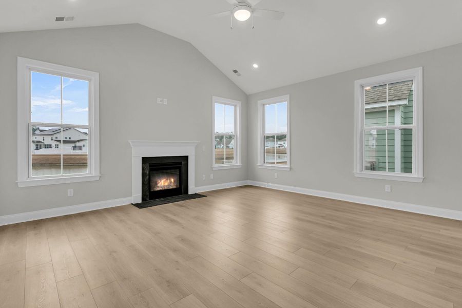 Spacious, unfurnished interior of a new home in Tidewater at Lakes of Cane Bay, Summerville (Image 30).