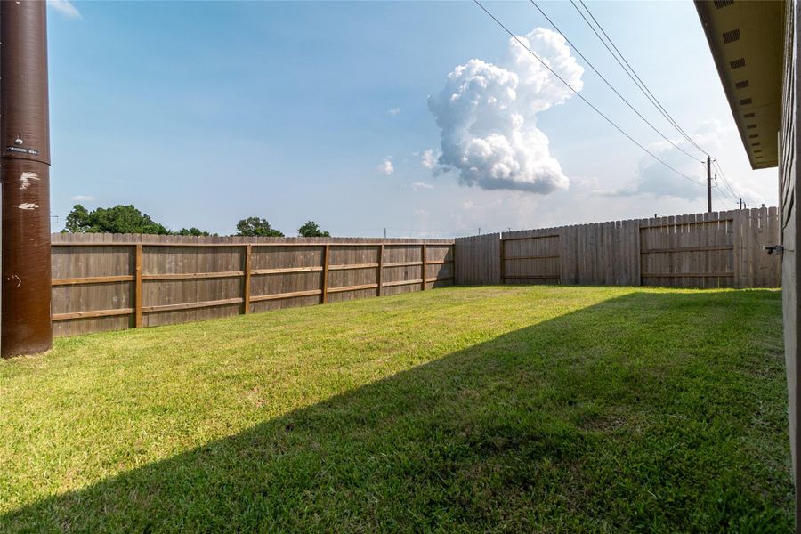 Front exterior of a new home in Burnet Fields at Baytown Crossings, Baytown, TX, highlighting curb appeal (Image 19). Front exterior of a new home in Burnet Fields at Baytown Crossings, Baytown, TX, highlighting curb appeal (Image 19).