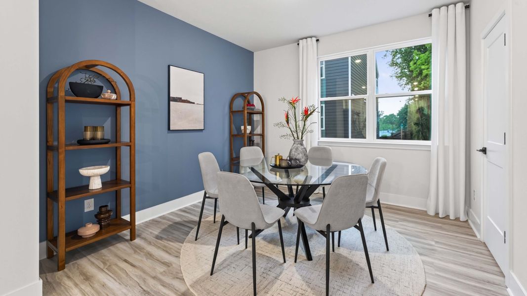 Representative furnished interior of a home built from the Carlton by D.R. Horton in Kingman Townhomes, Charlotte (Image 11).