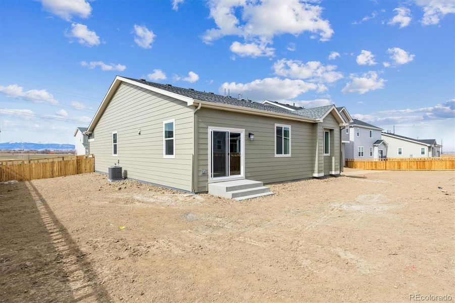 Exterior details and patio area of a home in Sweetgrass, Dacono (Image 17).