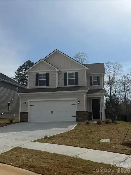 Front exterior of a new home in , Denver, NC, highlighting curb appeal (Image 10).