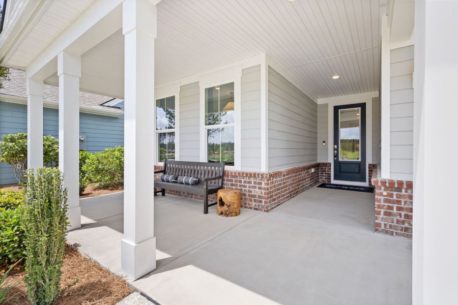 Exterior details and patio area of a home in Sun City Hilton Head, Bluffton (Image 4).
