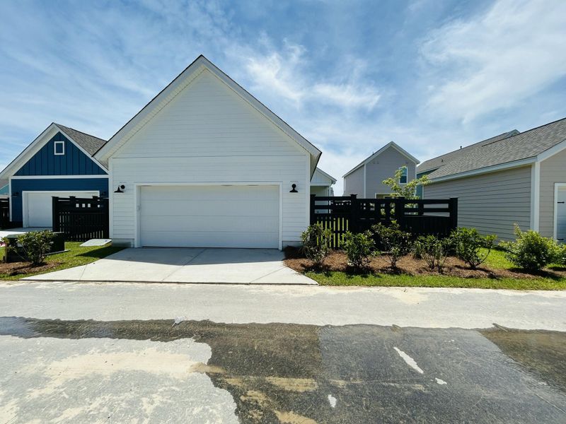 Exterior details and patio area of a home in The Domus Collection at Midtown Nexton, Summerville (Image 14).