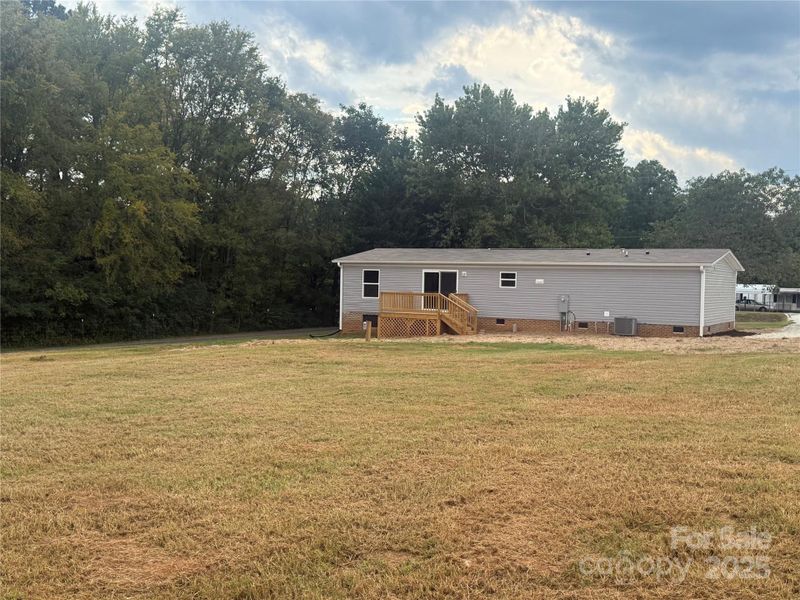 Front exterior of a new home in , Shelby, NC, highlighting curb appeal (Image 13).