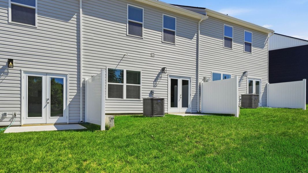 Exterior details and patio area of a home in The Arbor Townhomes, Kingsport (Image 16). Exterior details and patio area of a home in The Arbor Townhomes, Kingsport (Image 16).