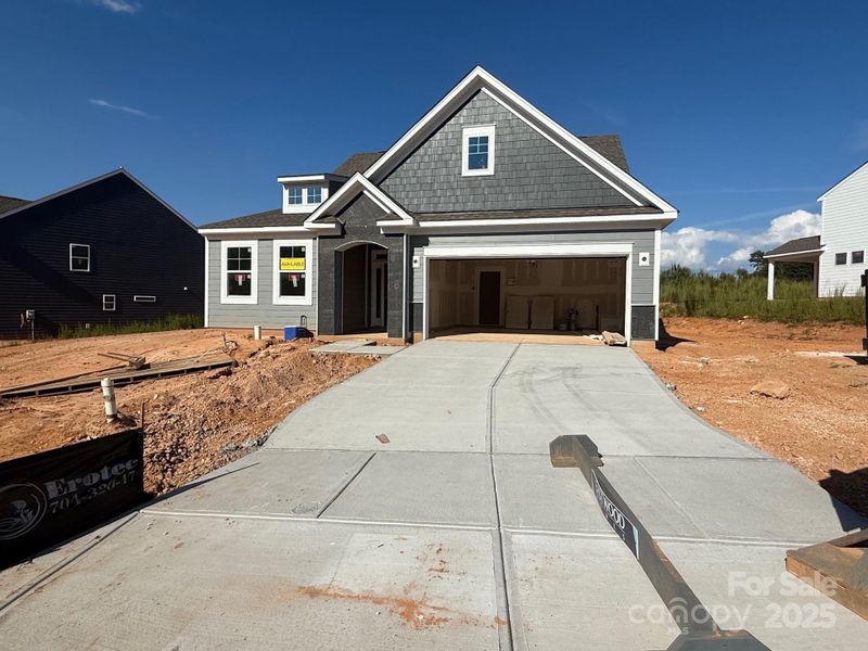 Front exterior of a new home in Carrington, Stanley, NC, highlighting curb appeal (Image 22).