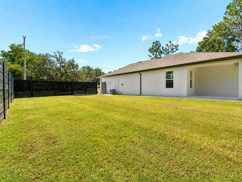 Exterior details and patio area of a home in , Spring Hill (Image 41).