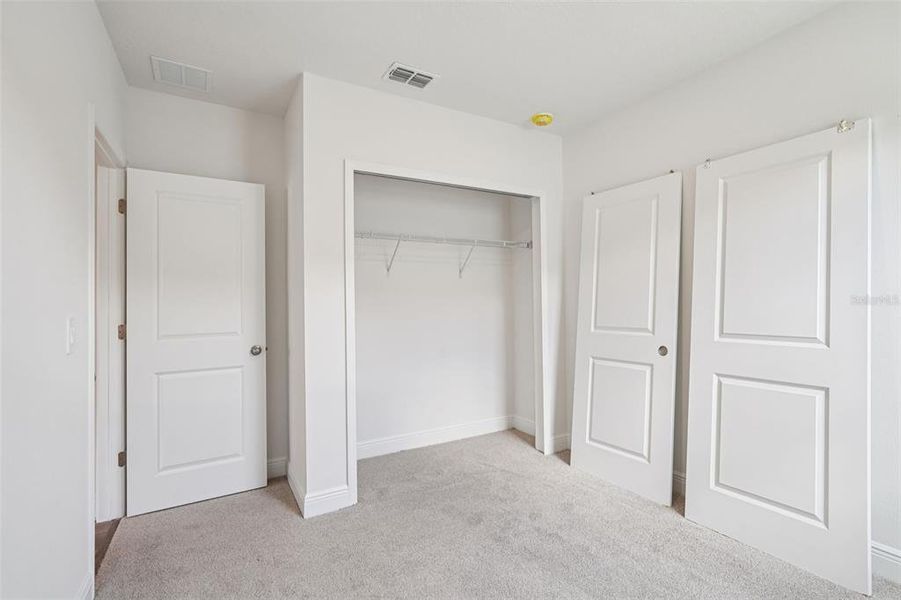 Spacious, unfurnished interior of a new home in The Reserve at Hammock Oaks - Signature Series, Lady Lake (Image 24).