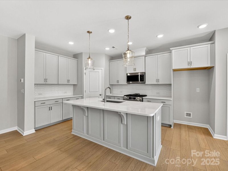 Furnished interior view inside a new home in North Creek Village - Townhomes, Huntersville (Image 11).