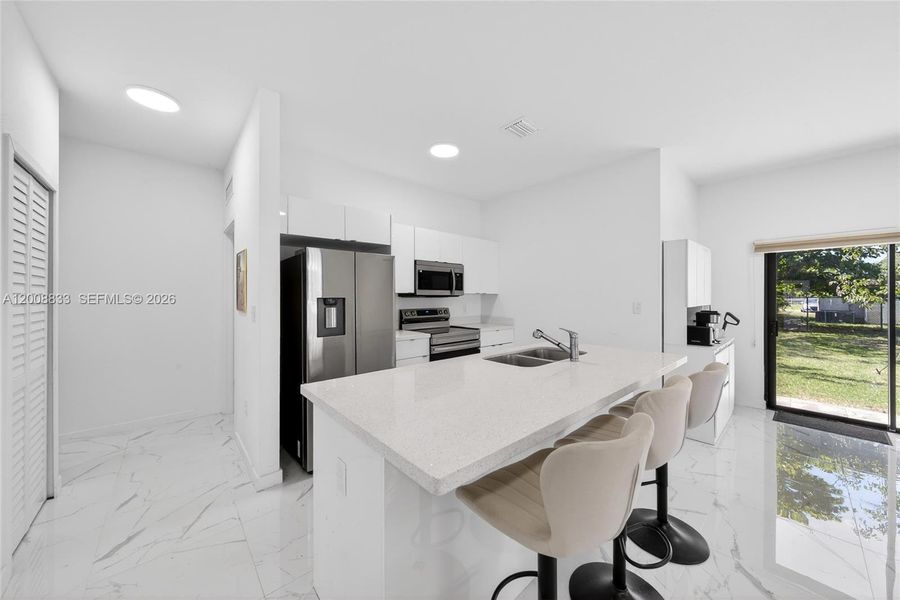 Furnished interior view inside a new home in , Miami (Image 9).