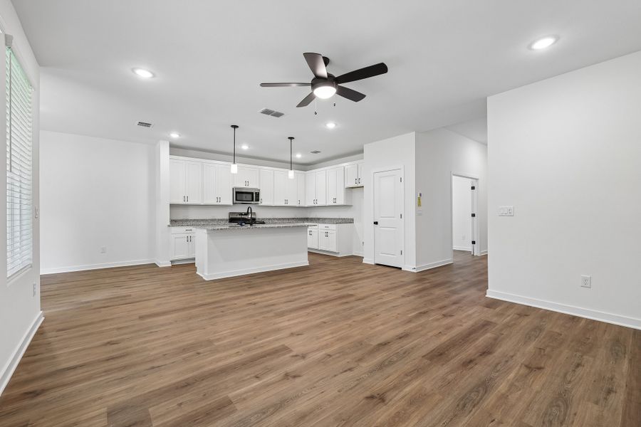 Representative unfurnished interior of a home built from the 4013 by Risewell Homes in Parkton Square, Kyle (Image 11).