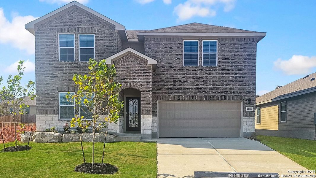Front exterior of a new home in Brookstone Creek, San Antonio, TX, highlighting curb appeal (Image 2). Front exterior of a new home in Brookstone Creek, San Antonio, TX, highlighting curb appeal (Image 2).