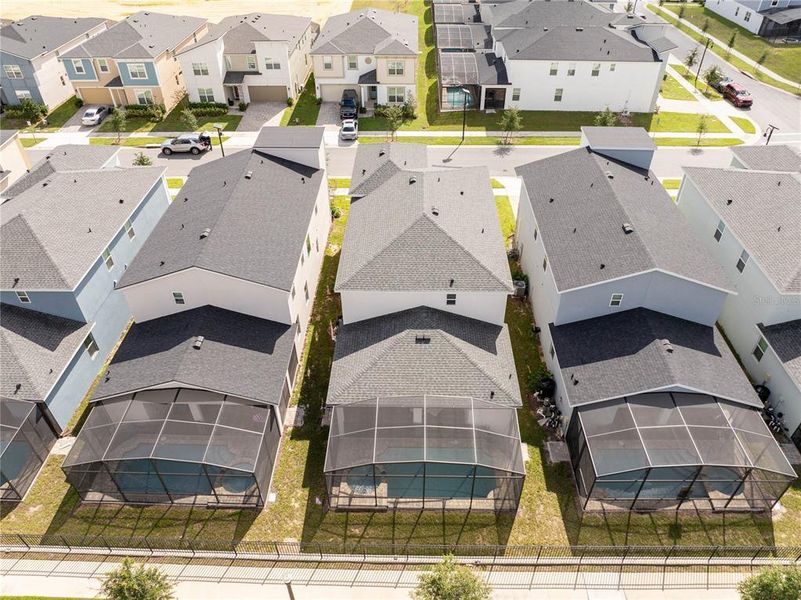 Front exterior of a new home in , Kissimmee, FL, highlighting curb appeal (Image 19).