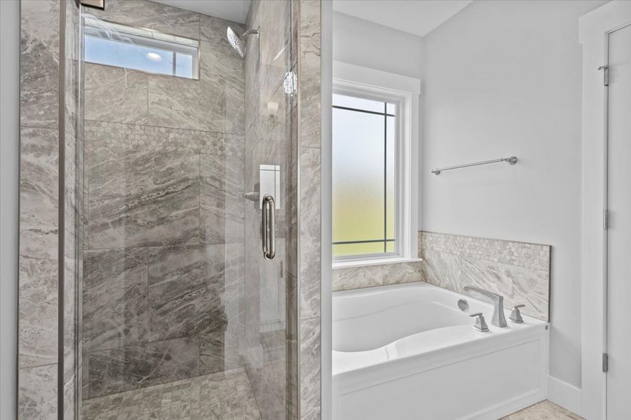 Representative furnished interior of a home built from the Hartford Elite by Enchanted Homes in Pointe Summit, Slater-Marietta (Image 16).