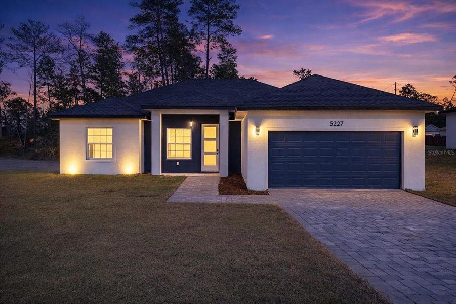 Front exterior of a new home in , Ocala, FL, highlighting curb appeal (Image 17).