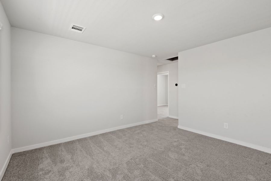 A hallway with white walls. A hallway with white walls.