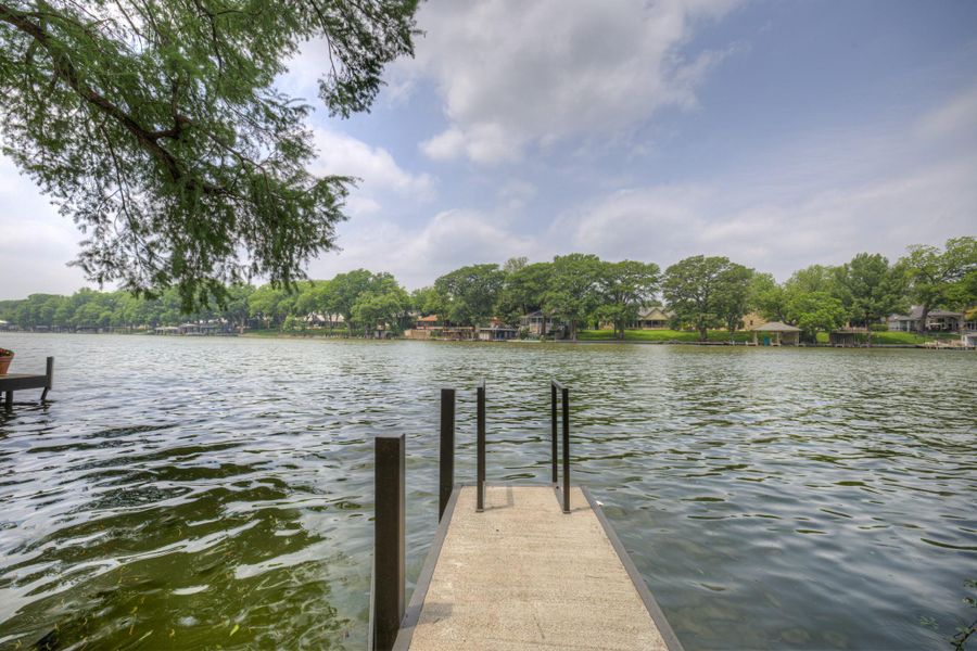Lake Ridge Subdivision private concrete dock extending over the water