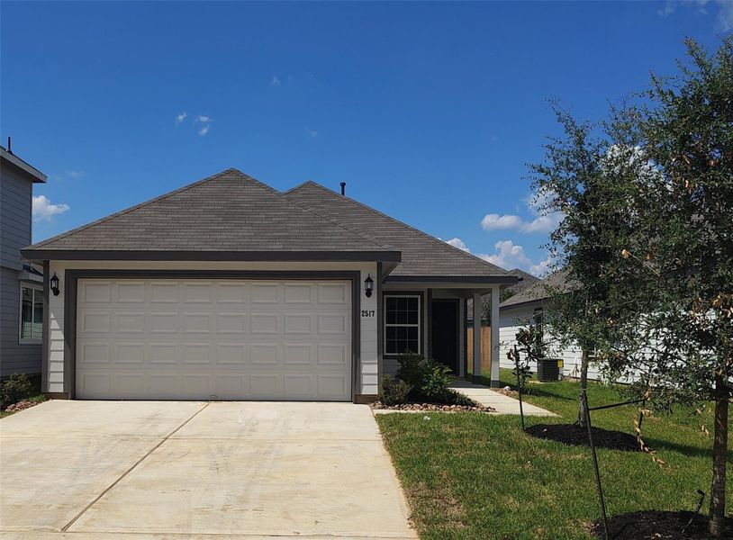 Front exterior of a new home in Cliffstone Hills, Conroe, TX, highlighting curb appeal (Image 1). Front exterior of a new home in Cliffstone Hills, Conroe, TX, highlighting curb appeal (Image 1).