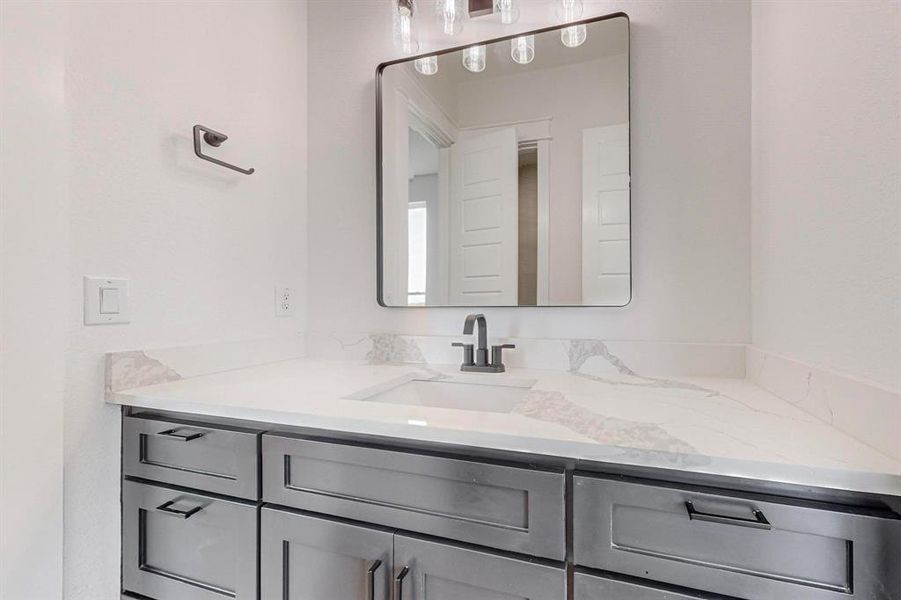 Bathroom featuring vanity