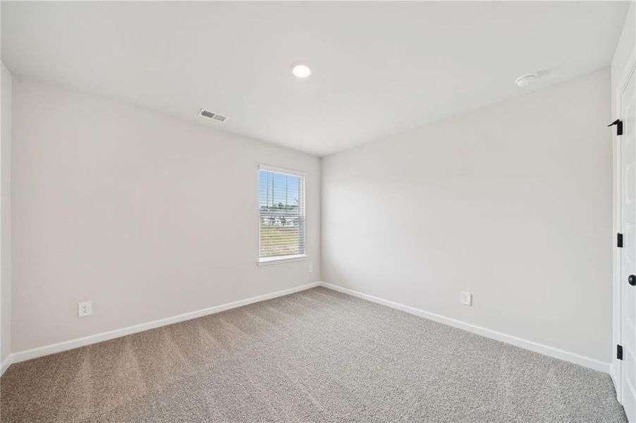 Spacious, unfurnished interior of a new home in Vines at Mill Creek - Estate Series, Braselton (Image 22).