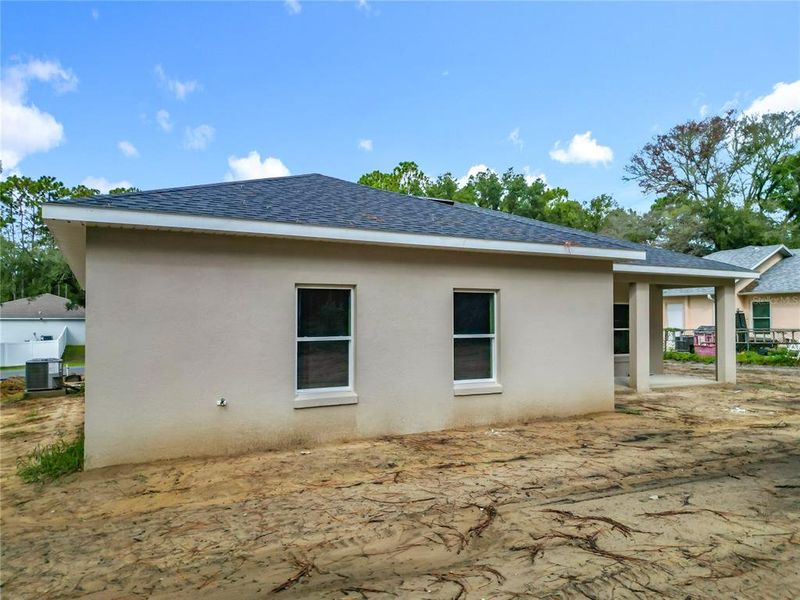 Front exterior of a new home in , Citrus Springs, FL, highlighting curb appeal (Image 13). Front exterior of a new home in , Citrus Springs, FL, highlighting curb appeal (Image 13).